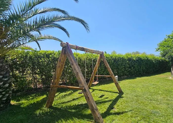 Large Mediterranea In The Heart Of Coral Shore With Swimming Pool Large Garden With Palm Trees Alghero